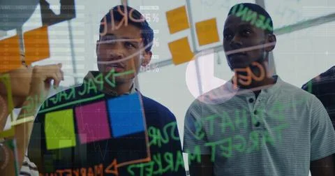 Studying two men in patterned sweater and grey polo, standing at glass partition Stock Photos