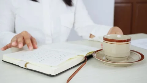 Studying While Drinking Coffee at Desk 스톡 동영상 347626404