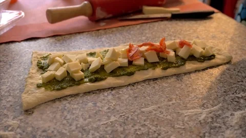 Stuff the bread with cheese, salami and vegetables Stock Footage 85315190