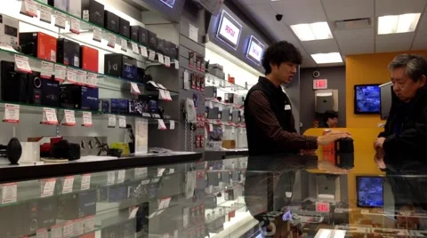 Stuff showing camera for customer Video stock 45924833