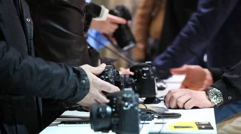 Stuff showing camera for customer in store Stock Footage 49238588