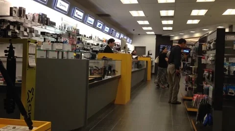 Stuff showing new camera for customer Video stock 43099170