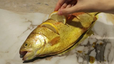 Stuff trout with lemon. Stock Footage 197116967
