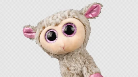 Stuffed and fluffy plush toy sheep playing and dancing. Alpha channel included. Stock Footage 276831571