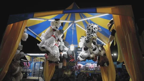 Stuffed animals Fun &amp; games at a carnival at night during the Spring Video stock 199843504