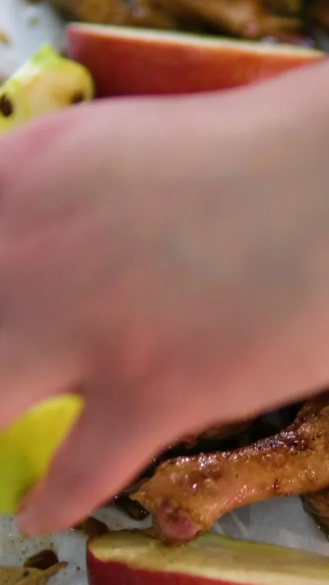 Stuffed with apples baked duck with a crispy crust on a baking sheet. Festive Stock Footage 325636563