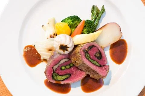 Stuffed beef steaks Stock Photos