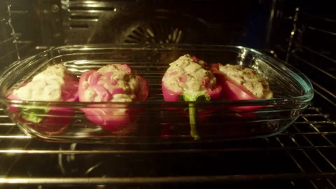 Stuffed bell pepper cooking Video stock 165265912