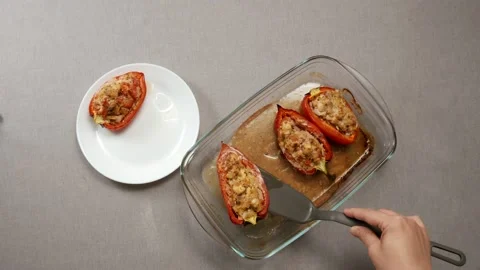 Stuffed bell peppers on plate Stock-Footage 165265299