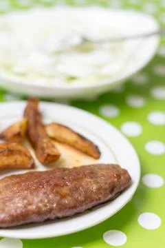 Stuffed burger with potatoes Stock Photos
