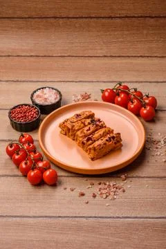 Stuffed cabbage rolls with rice and chicken or pork, seasoned with salt and.. Stock Photos