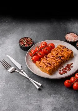 Stuffed cabbage rolls with rice and chicken or pork, seasoned with salt and.. Stock Photos