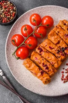 Stuffed cabbage rolls with rice and chicken or pork, seasoned with salt and.. Stock Photos
