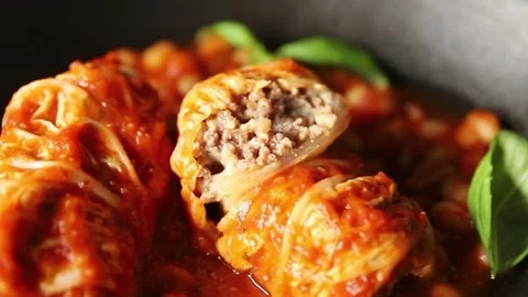 Stuffed cabbage tomato sauce with beans meat, cabbage, fresh delicious Stock Footage 314525264