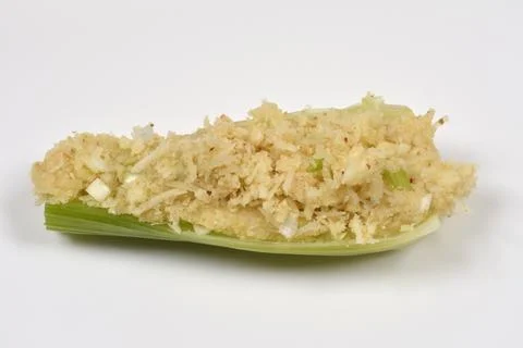 Stuffed celery stalk ready for baking Stock Photos