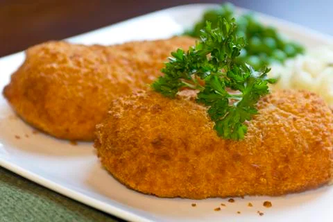 Stuffed chicken cordon bleu Stock Photos