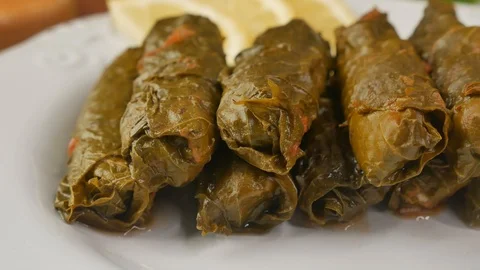 Stuffed Dolma roll impaled on fork, close up Stock Footage 107626782