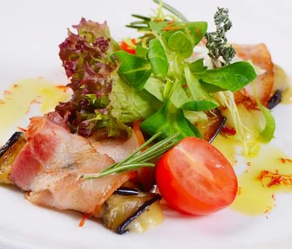 Stuffed eggplants with bacon and cheese Stock Photos