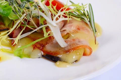 Stuffed eggplants with bacon and cheese Stock Photos