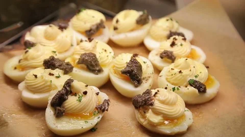 Stuffed eggs on restaurant or hotel kitchen served for client Stock Footage 74397510