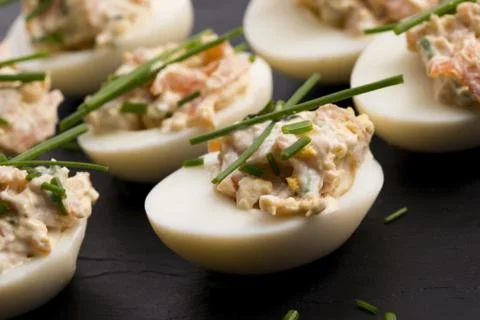 Stuffed eggs with salmon Stock Photos