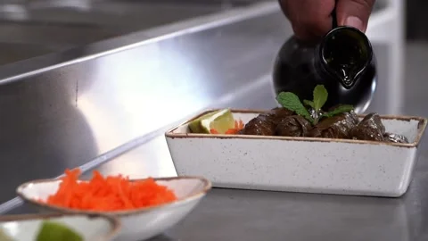 Stuffed Grape Leaves with Mint and Lime Stock Footage 318310189
