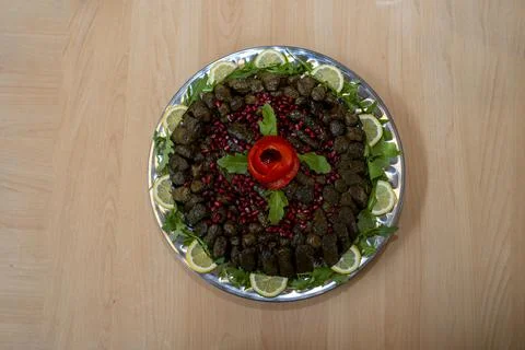 Stuffed grape leaves stuffed with a mixture of rice, meat, and spices. Stock Photos