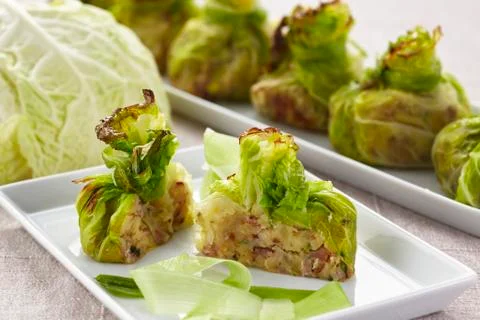 Stuffed, gratinated cabbage parcels 스톡 사진