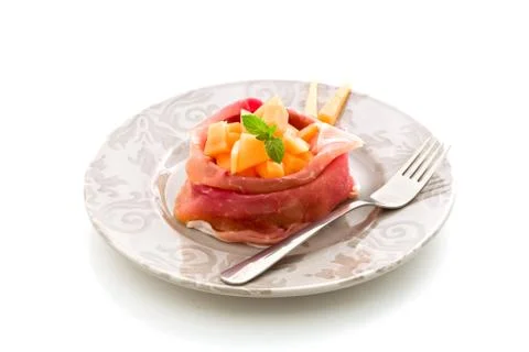 Stuffed ham with melon Stock Photos
