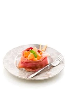 Stuffed ham with melon Stock Photos