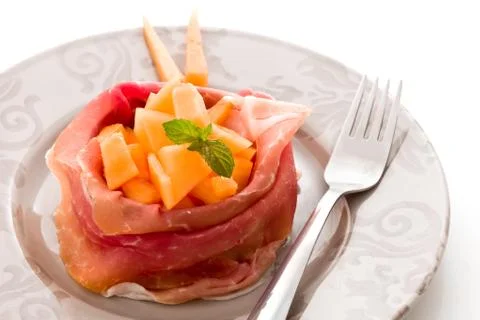 Stuffed ham with melon Stock Photos