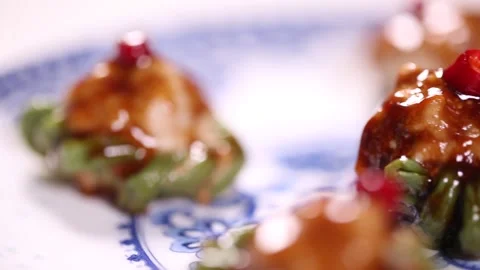 Stuffed meat with beans on a plate (2) Stock Footage 202160321