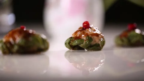 Stuffed meat with beans on a plate (6) Stock Footage 202160340