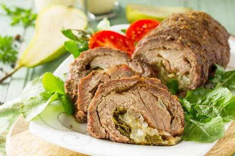 Stuffed Meat close-up Roll with Pear and Cheese. Foto stock