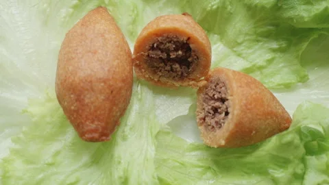 Stuffed Meatballs close up with salads presented Stock Footage 295941151