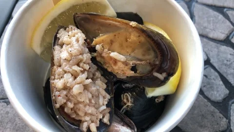 Stuffed mussels with lemon. Stock Footage 272640860