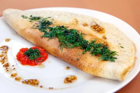 Stuffed omelet for breakfast Stock Photos
