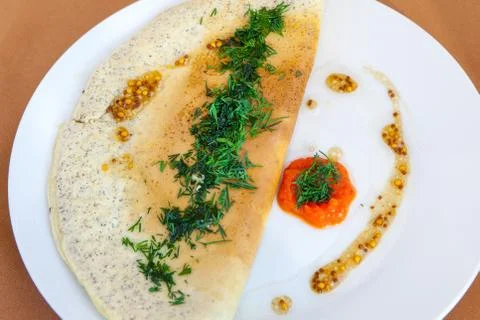 Stuffed omelet for breakfast Stock-Fotos