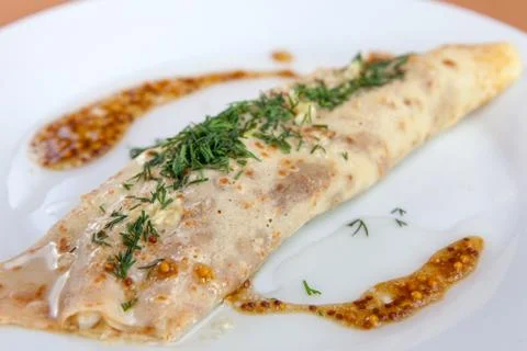 Stuffed omelet for breakfast Stock Photos