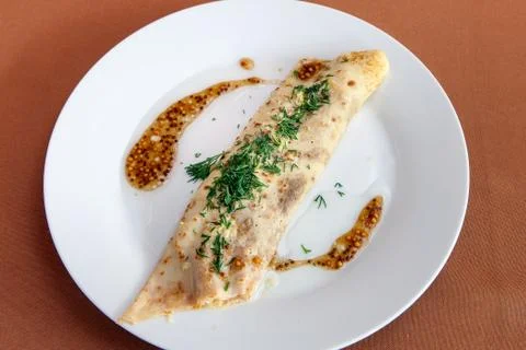 Stuffed omelet for breakfast Stock Photos