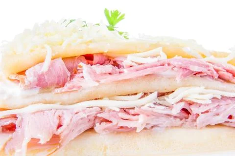 Stuffed pancake with ham and cheese Stock Photos