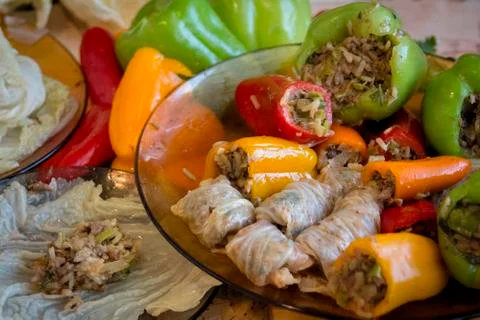 Stuffed peppers and stuffed cabbage leaves. Stock Photos