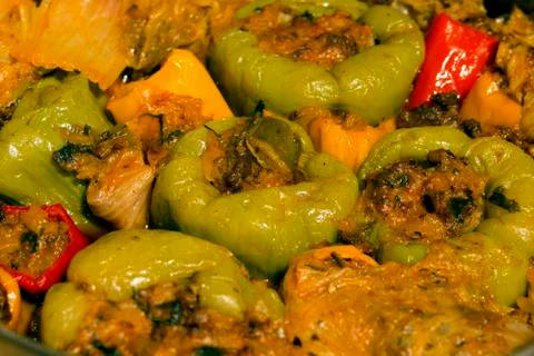 Stuffed peppers and stuffed cabbage leaves. Stock Photos