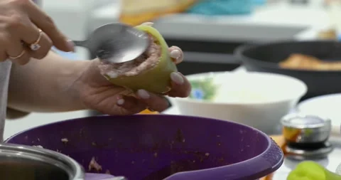 Stuffed peppers cooking Video stock 145520494