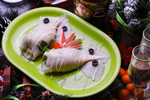 Stuffed squid is on the New Year's table. Stock Photos