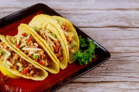 Stuffed taco shells, mexican dish tacos. Stock Photos