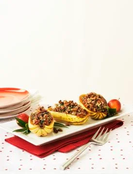 Stuffed winter squash with nuts Stock Photos