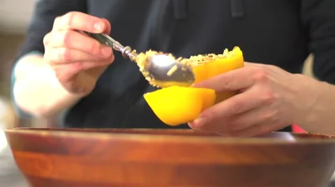 Stuffed yellow pepper preparation Stock Footage 43444617