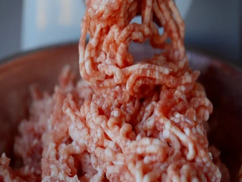 The stuffing comes out of the grinder 스톡 동영상 73973230