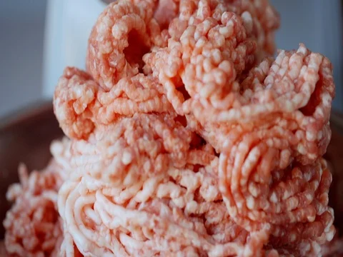 The stuffing comes out of the grinder Stock Footage 73975896